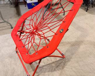 Red folding bungee chair