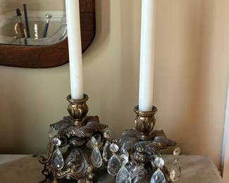 Pair of Hollywood Regency brass and glass candlesticks