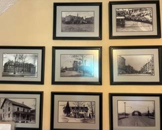 Black and white framed photographs of historic Charlotte landmarks and sites