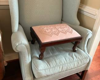 Two wingback chairs and footstool