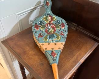 Vintage Scandinavian-style fireplace bellows featuring hand-painted Rosemaling folk art