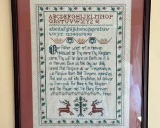Framed cross stitch sampler