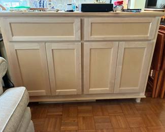 Unfinished wood cabinet with two drawers and storage underneath