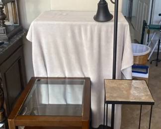 A Table, A Stand, And A Lamp
