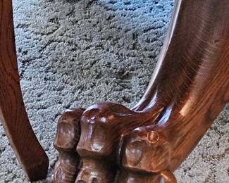 Lion paws on Oak table