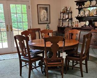 Oak table and six matching chairs