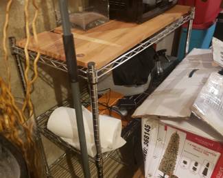 Christmas trees, microwave, metal shelves