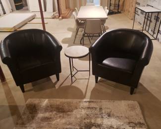 Barrel chairs and side table