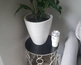 Side table with decorative planter