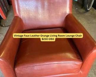 Vintage Faux Leather orange living room lounge chair.