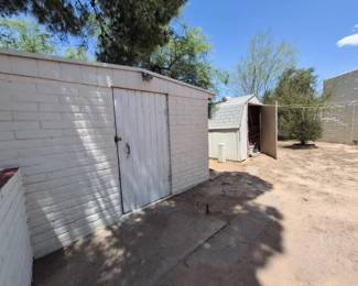 Workshop & extra storage shed with more in both