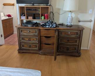 Solid oak dresser with three hidden drawers, TV, DVD player, small radio, additional speakers, tv stand with shelves
