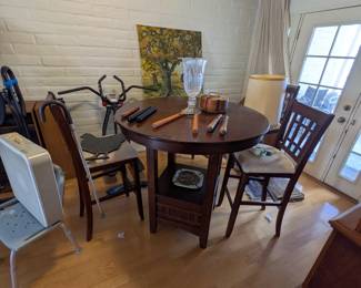 Modern high top round wood table, 4 chairs, nunchucks both practice and wooden