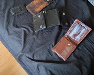Various leather wallets and holster for phone