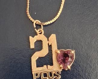 Large gold 14kt 21 plus pendant