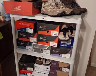 Lots of new in box women's shoes and new women's clothing (not shown)