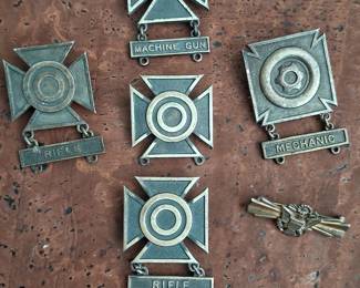 Sterling silver antique military badges
