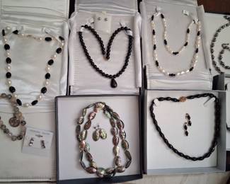 Pearl and abalone necklaces