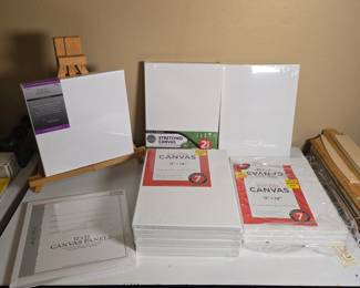 Lot of Canvas & Easel