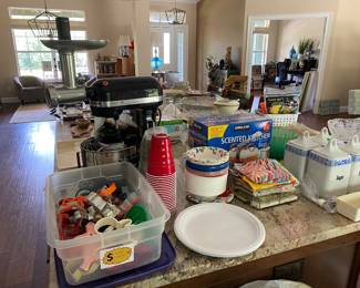 KitchenAid mixer with meat, grinder, attachment, and other kitchen goods