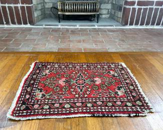Small antique Persian rug