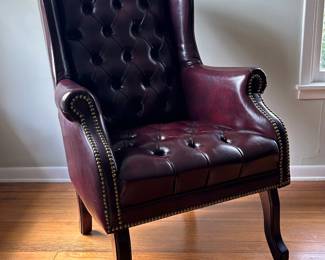 Leather tufted wingback chair