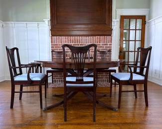 Antique magonay dining table and six matching chairs