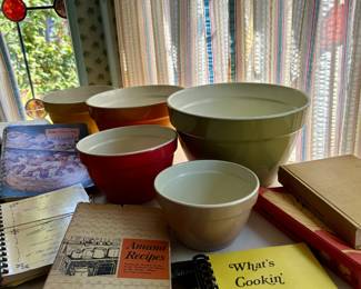 MCM Kitchen Classics Colorful vintage melamine mixing bowls paired with retro cookbooks and plenty of nostalgic charm.