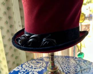 Velvet Top Hat  Velvet Top Hat • Theatrical & Steampunk Style A dramatic burgundy velvet top hat adorned with black trim and fabric roses. Perfect for theatrical costuming, Victorian-inspired fashion, steampunk enthusiasts, performers, hat collectors, and statement dressing.
