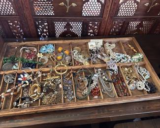 Vintage jewelry and beaded necklaces, pearls, rhinestone-style pieces, chains, pendants, and bracelets.