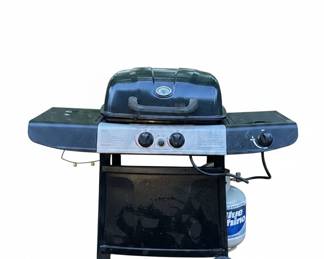 Blue Rhino Gas Grill with partially filled tank and accessories
