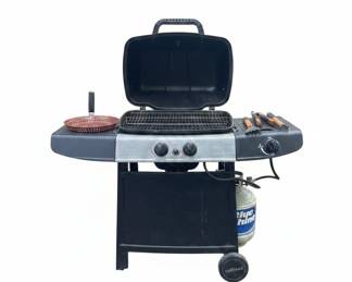 Blue Rhino Gas Grill with partially filled tank and accessories