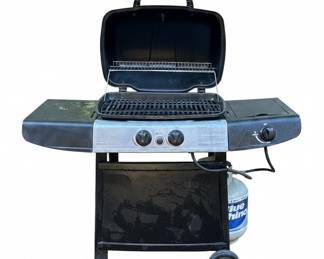 Blue Rhino Gas Grill with partially filled tank and accessories