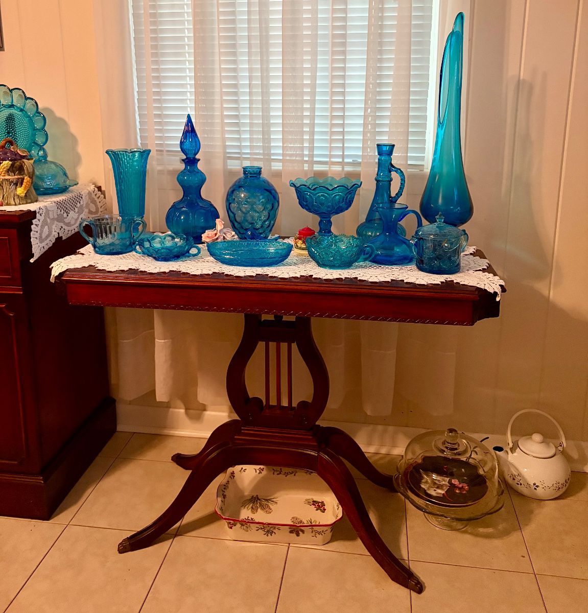 Duncan Phyfe  style  table, vintage blue glass from the 1960's and 70's