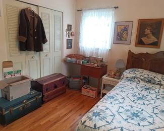 Steamer trunks and vintage sewing machine. With, you guessed it - more art