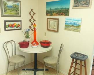 2 seater vintage table and paintings