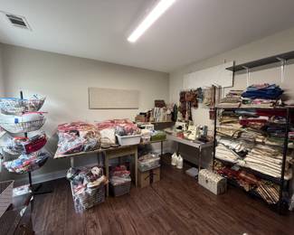 Bags and bags of high end beaded and woven gorgeous trim! Bags of ribbon spools. Tons of fabrics. Lots of floral pieces. Look at those tassels!