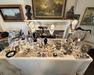Lots of costume jewelry, some sterling and one gold diamond and ruby ring