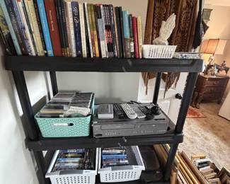 Books, CDs, VHS, DVDs, VHS player