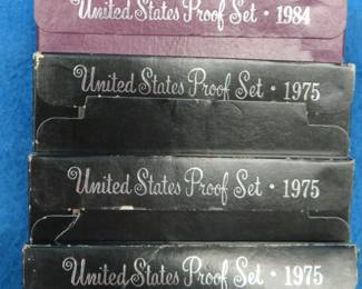 Lot 197. Four Proof Sets: 1975 (3), 1984. One Mint Proof Set 1995.