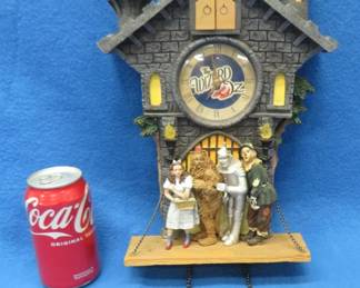 Lot 390. Battery-operated Wizard of Oz clock. Untested.