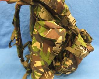Lot 437. Large hiking backpack with reinforced back support and detachable day pack. Appears to be unused.