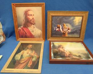 Lot 91. Four religious framed pictures including a 24" x 18" print of a Flag on a Cross with a scripture. The back lit picture needs a cord.