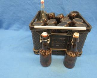 Lot 234. 15 porcelain locking cap beer bottles