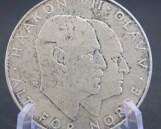 Lot 260. 1970 Norwegian 25 kroner silver coin. .825 silver. 29 grams.