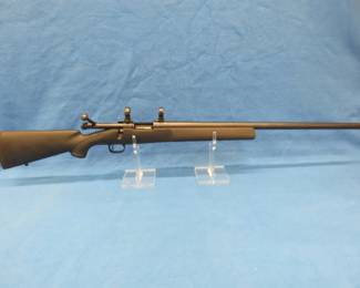 Lot 438. Winchester Model 70 Stealth II 223 WSSM bolt-action rifle. S/N G2536924. Includes synthetic stock, scope rings, and a Koplin hard-sided case.