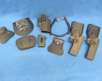 Lot 421. Holsters and more