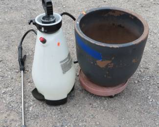 Lot 123. Three-gallon sprayer and a flower pot on a rolling base