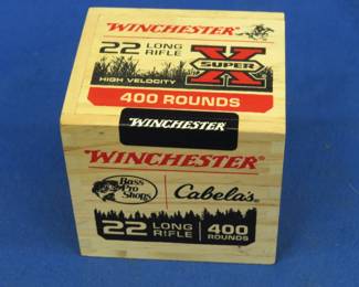 Lot 221. 400 Winchester 22LR rounds in a small wooden crate from Bass Pro Shops / Cabela's