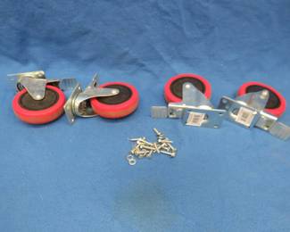 Lot 76. Four 5-inch heavy-duty casters with mounting hardware